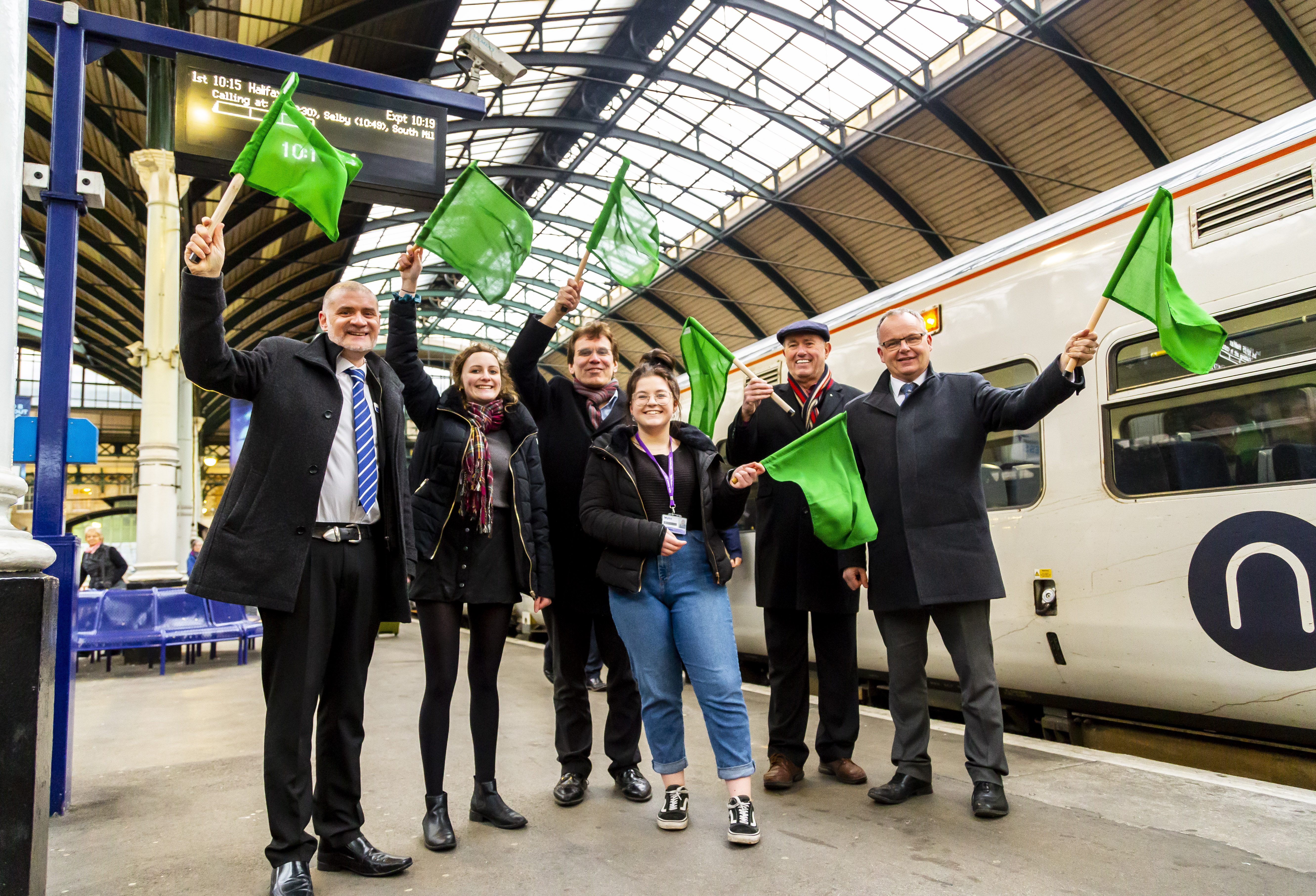 People wave off a new train at Hull Paragon Station