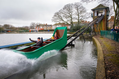 Cllr Craker is joined by park visitors on the splash boat